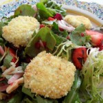 Mixed Baby Greens with Shallots, Berries, Walnuts and Raspberry-Walnut Vinaigrette with Baked Goat Cheese 