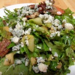 Baby Greens with Fuji Apples, Scallions, Candied Pecans and Blue Cheese with a Pomegranate Balsamic Vinaigrette