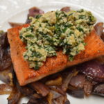 Salmon with Spinach-Walnut Pesto with Purple Potato & Red Onion Hash