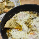 Shakshuka – Baked Eggs on a Bed of Tomatillo, Zucchini, and Za’atar Spices with Feta Cheese