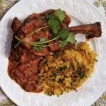 Moroccan Braised Lamb Shanks with Quince and Couscous with Apricots, Mint, Cilantro, Parsley and Fried Shallots